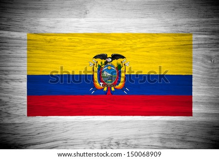 Ecuador flag on wood texture