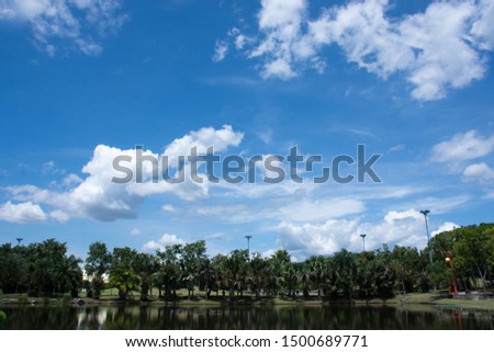 Reservoir, the background is sky and fluffy clouds