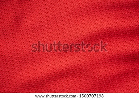Red sports clothing fabric football jersey texture close up Royalty-Free Stock Photo #1500707198