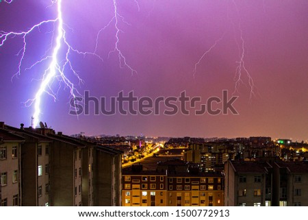 lightning falling into the night city