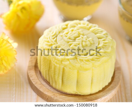 Snowy skin mooncakes.  Traditional Chinese mid autumn festival food. The Chinese words on the mooncakes means lotus paste, not a logo or trademark.