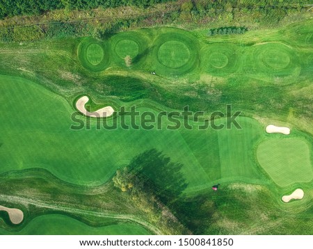 Aerial photos of Golf club, green lawns, forests, lawn mowers, Flatley.