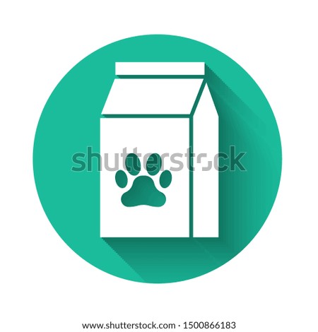 White Bag of food for pet icon isolated with long shadow. Food for animals. Pet food package. Dog or cat paw print. Green circle button