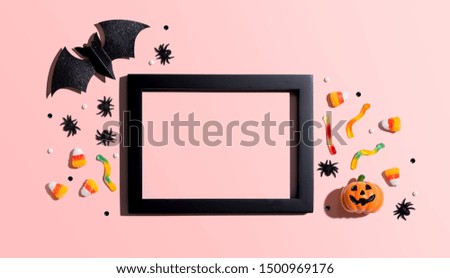 Halloween theme decoration with photo frame - overhead view flat lay