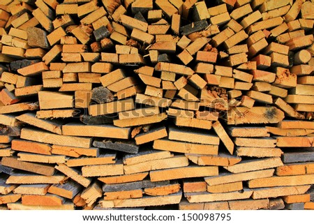 Texture background of a stack of wood fire and multipurpose wood preparing for the Winter 