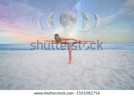 Beautiful woman is practicing yoga on the beach on Milky Way background, starry sky.
