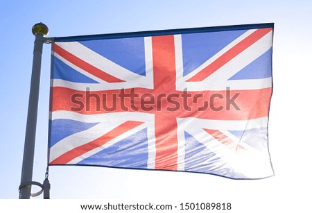 british flag of great britain on blue sky