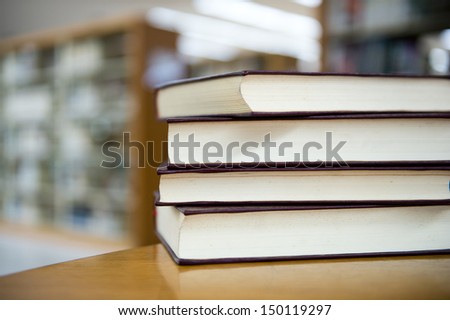 library with stack of books.