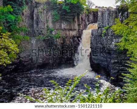 High Force is a waterfall on the River Tees, near Middleton-in-Teesdale, Teesdale, County Durham, England. One of the most impressive waterfalls in England. Royalty-Free Stock Photo #1501221110
