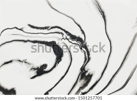 photography of abstract marbleized effect background. black and white creative colors. Beautiful paint Royalty-Free Stock Photo #1501257701