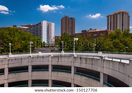 View of parking garage ramp and highrises in Towson, Maryland.