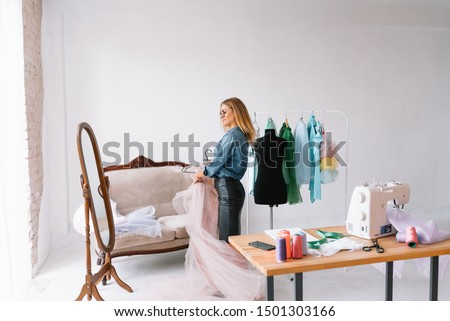 Fashion designer in her studio