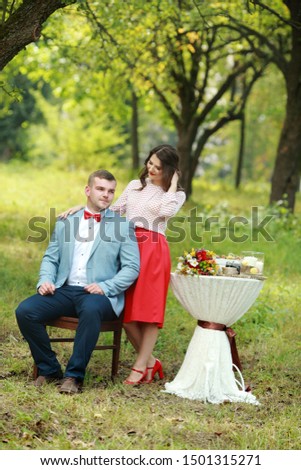 Young couple in love. Cute couple in the park on a sunny day
