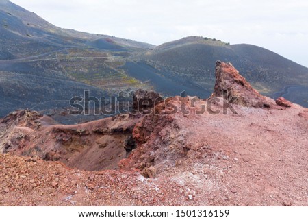 The colorful crater of the volcano Teneguia in the south of La Palma.