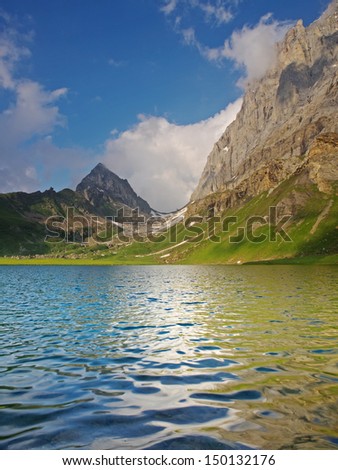 Alpine landscape with lake (Seewlisee,WindgÃ?Â¤llen, Schwarz StÃ?Â¶ckli)