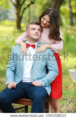Cute couple in the park on a sunny day
