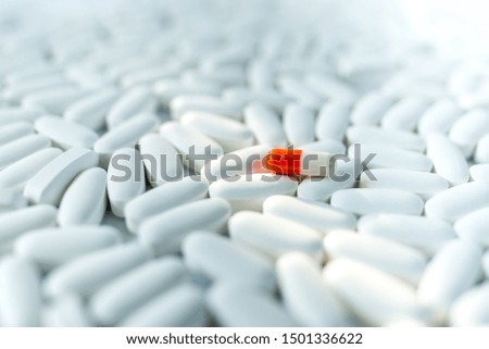  pills on temperature and virus on white background