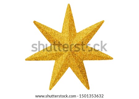 Macro of gold Christmas star isolated on white background