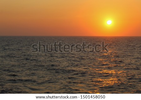 A romantic colorful sunset over the Aegean sea 