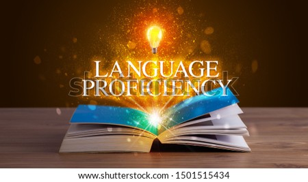 LANGUAGE PROFICIENCY inscription coming out from an open book, educational concept