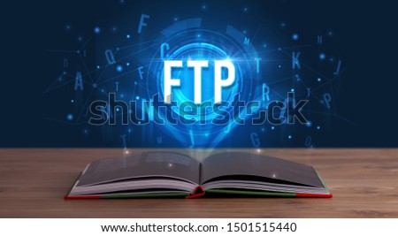 FTP inscription coming out from an open book, digital technology concept