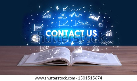 CONTACT US inscription coming out from an open book, business concept