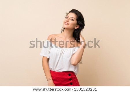 Young woman over isolated background thinking an idea