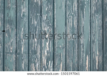Background photo of weathered gray old green wooden laths full screen display
