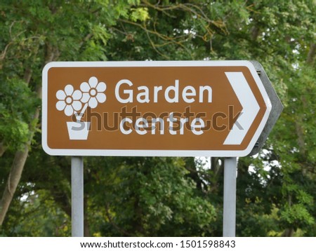 Road direction sign to garden centre in the UK