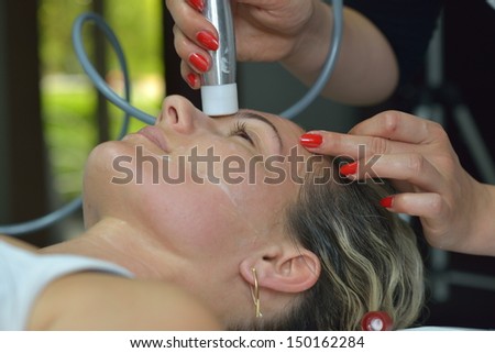 young woman getting cosmetic treatment