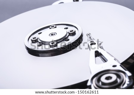 Closeup of disassembled hard disk drive.