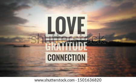 Blurry sunset background with text written - Love, Gratitude, Connection