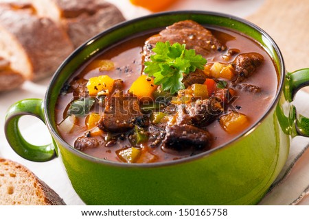 Tasty winter traditional hot pot stew with meat and vegetables stewed in a rich gravy for a wholesome meal on a cold day Royalty-Free Stock Photo #150165758