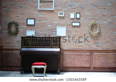 piano frame and the wall
