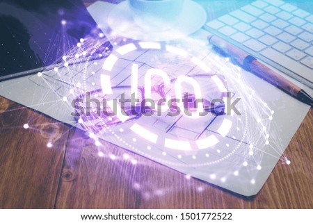 Crypto theme hologram with glasses on the table background. Concept of blockchain. Double exposure.
