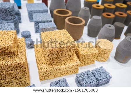 Chemical ceramics,foam ceramic filter. high temperature resistant silicon carbide casting. Royalty-Free Stock Photo #1501785083