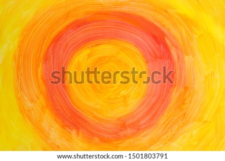 Action painting. Abstract Hand-painted yellow and orange art background. Multicolored paint strokes and brush.