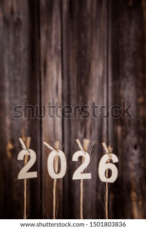 New year calendar 2026 concept on old brown wood