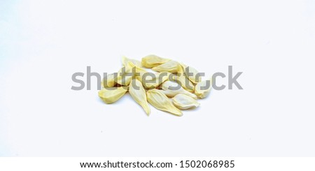 A picture of orange seed's on white background