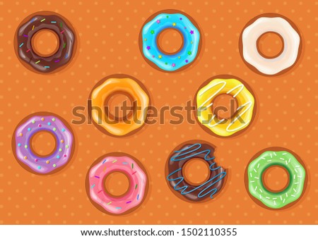 Set of different donuts on brown background. Delecious dessert. Colorful donuts 