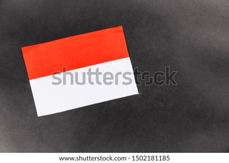 indonesia flag on a black background with copy space