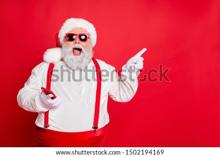 Advert ad laugh choose discount shopping choice people concept. Photo of amazed astonished tell you interesting information hipster modern santa demonstrating copy space isolated vivid background