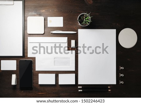 Blank stationery set on wooden background. Template for branding identity. For graphic designers presentations and portfolios. Flat lay.