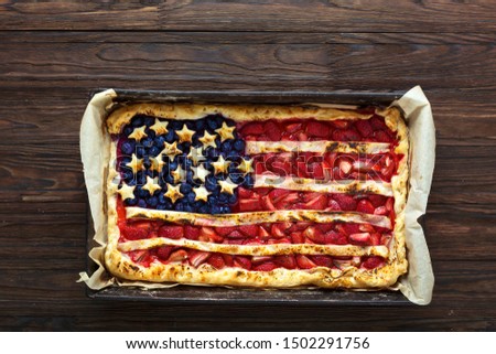 Berry pie in the form of the American flag. Independence Day, Labor Day, Memorial Day. American patriotism concept.