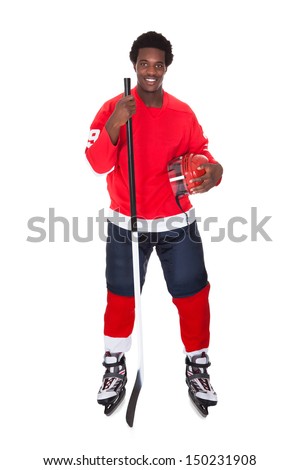 Portrait Of African Ice Hockey Player Isolated Over White Background
