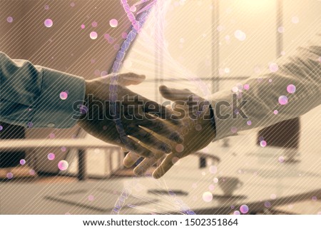 Multi exposure of DNA icon hologram on office background with two men handshake. Concept of education