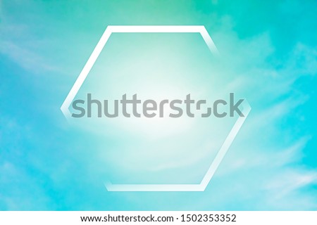 Abstract design template for a quote, teal blue sky background with white clouds and a polygonal frame, a texture with a place for text and logo