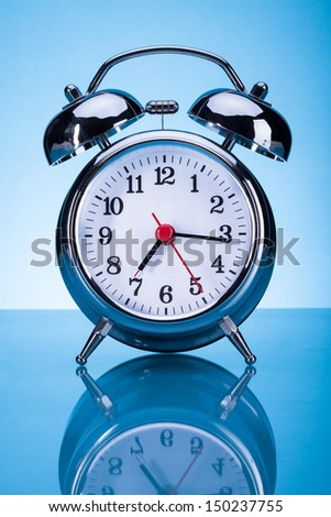 Photo Of Alarm Clock Over Blue Background