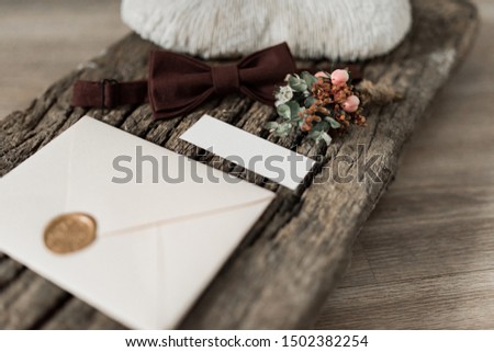 wedding invitation card, wax seal, vase, sea stone, flowers. Wedding calligraphy vintage top view. Bridal morning details.