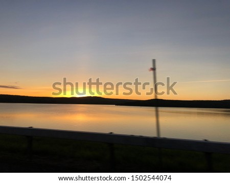 Sunset over a lake in New York